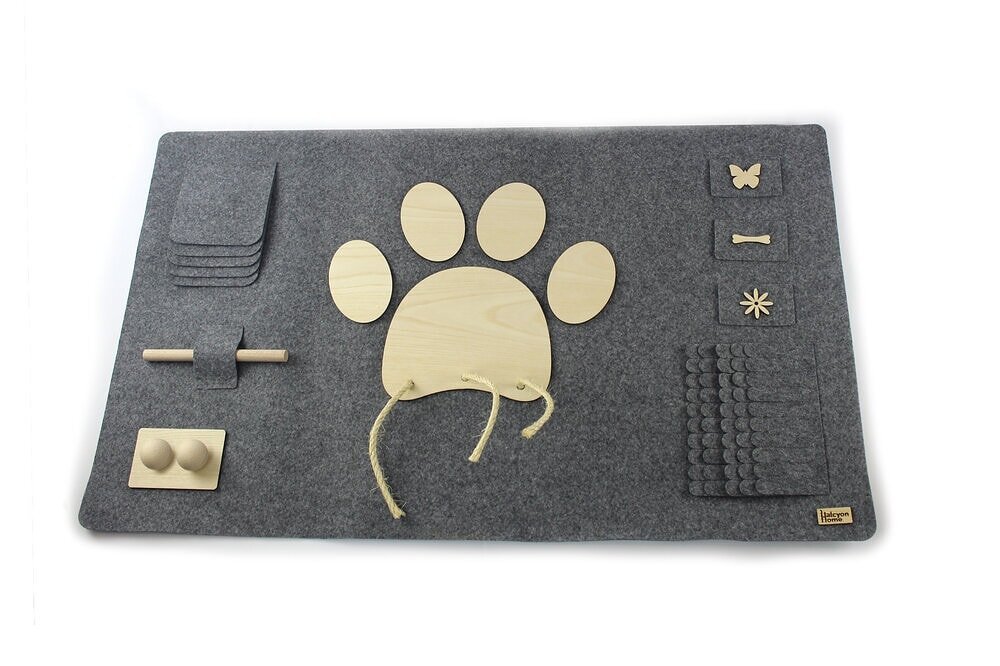 :) PAWLEDGE dog intelligence training mat

Do you want to train your humans to make them more intelligent? 
Do you want them to learn words to understand them better?

With the intellectual training mat you will teach them words to know what they wan