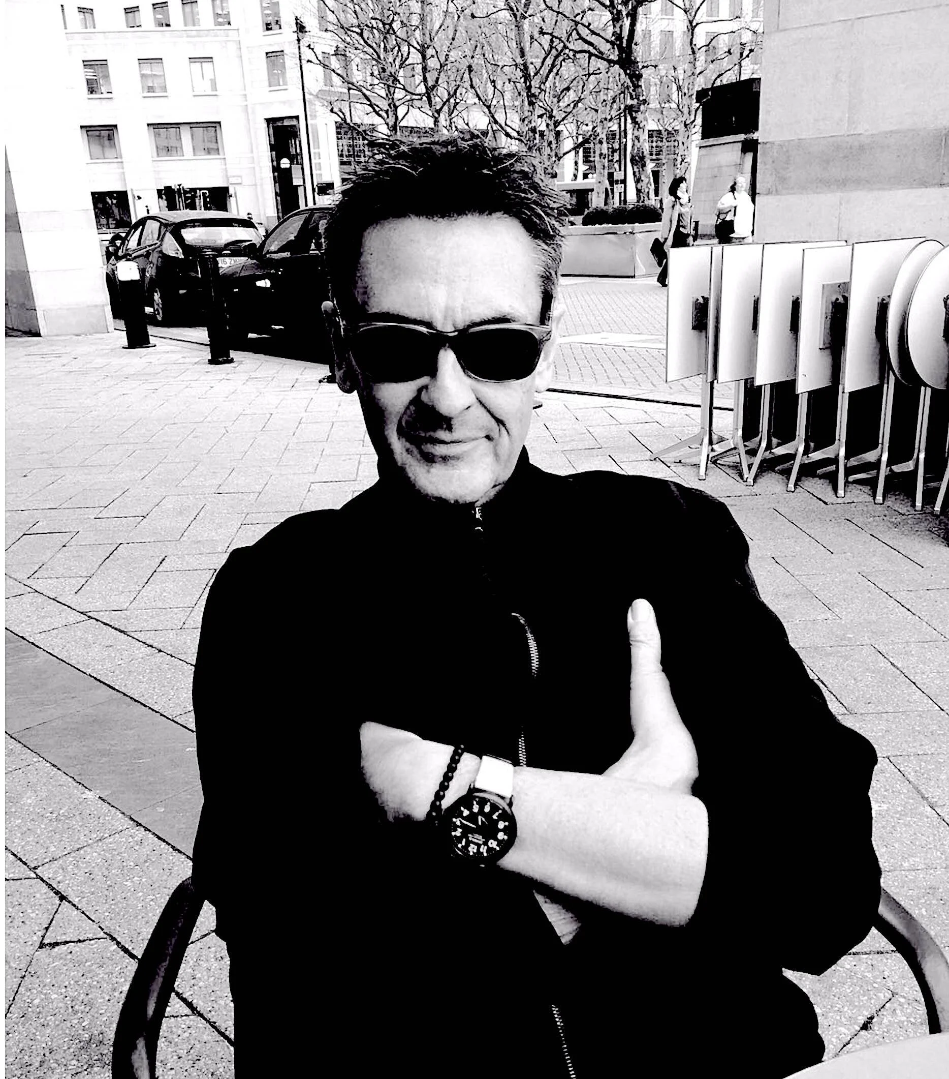 JOHN CASWELL ARMS CROSSED.jpg