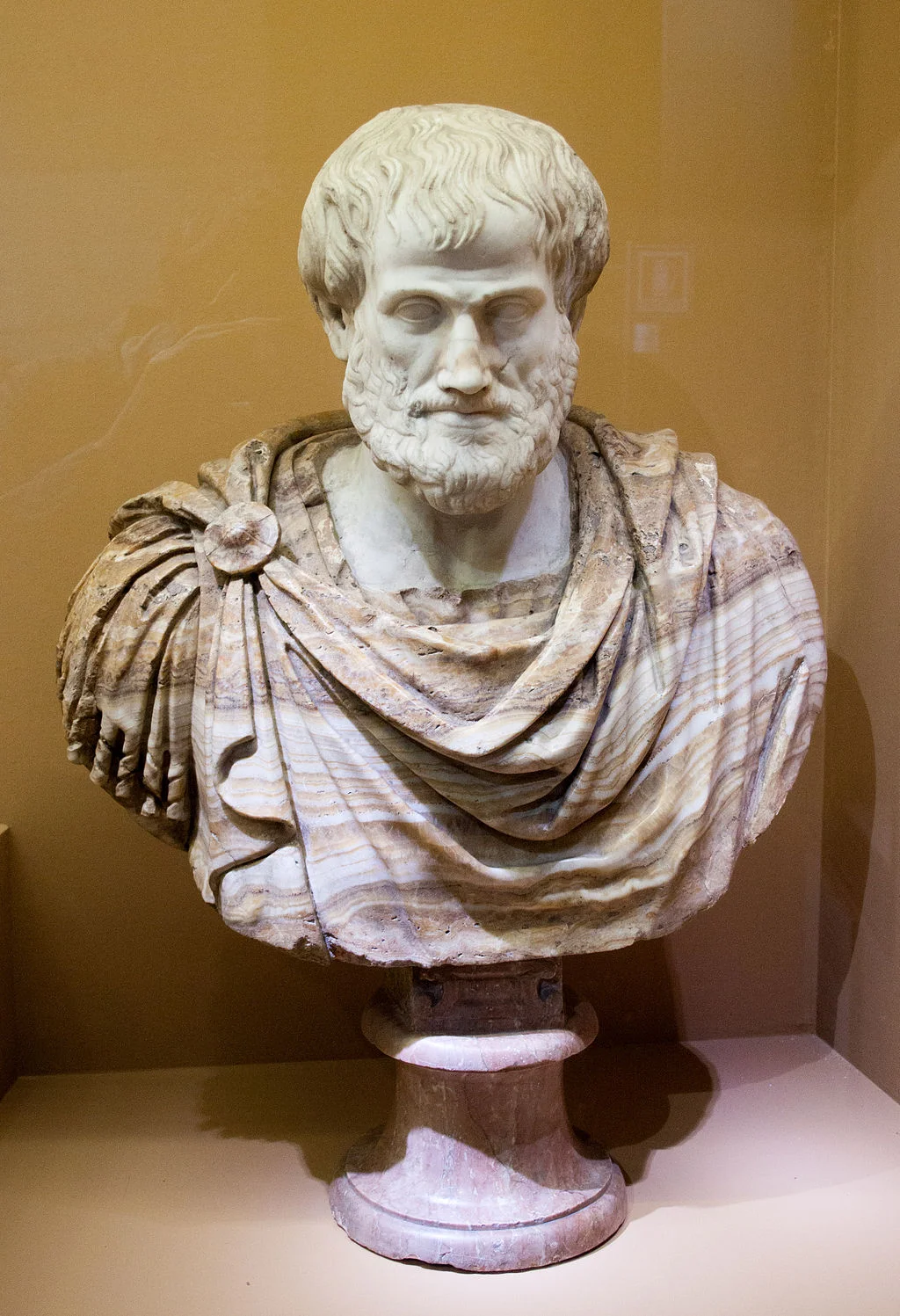 Bust of Aristotle. Marble, Roman copy after a Greek bronze original by Lysippos from 330 BC; the alabaster mantle is a modern addition (Wikimedia Commons)