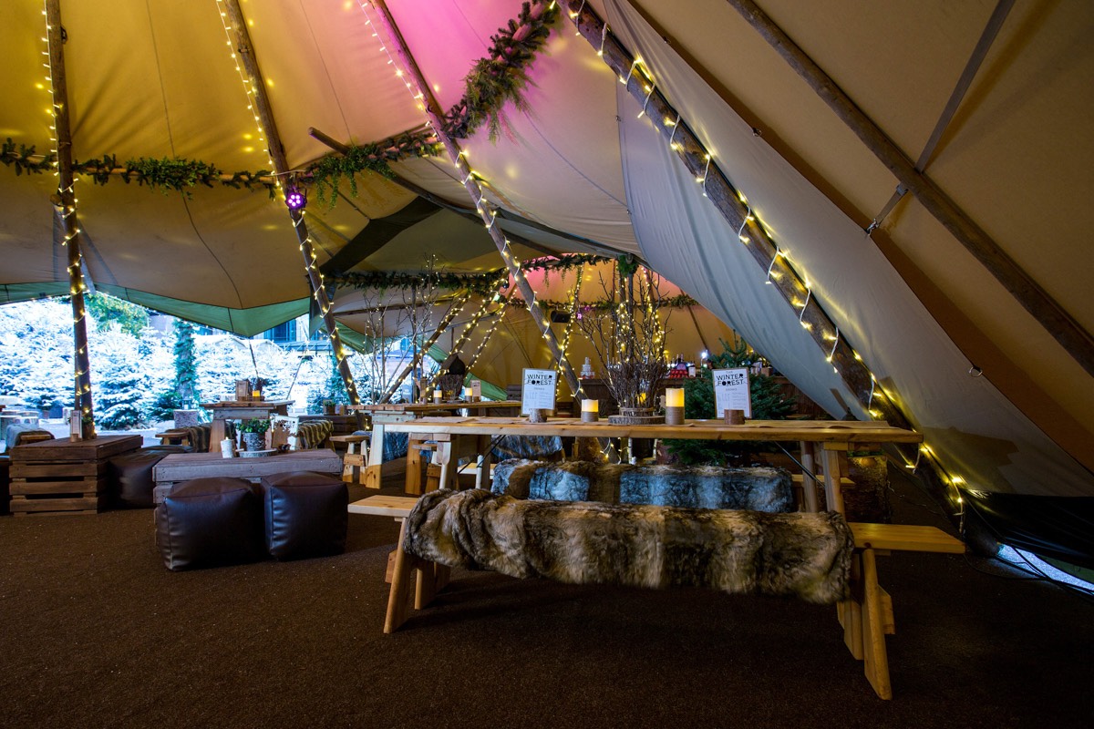 Even in winter our giant tipi tent marquees make a perfect space and can come with heating and wooden doors, ideal for a winter wedding our corporate event.