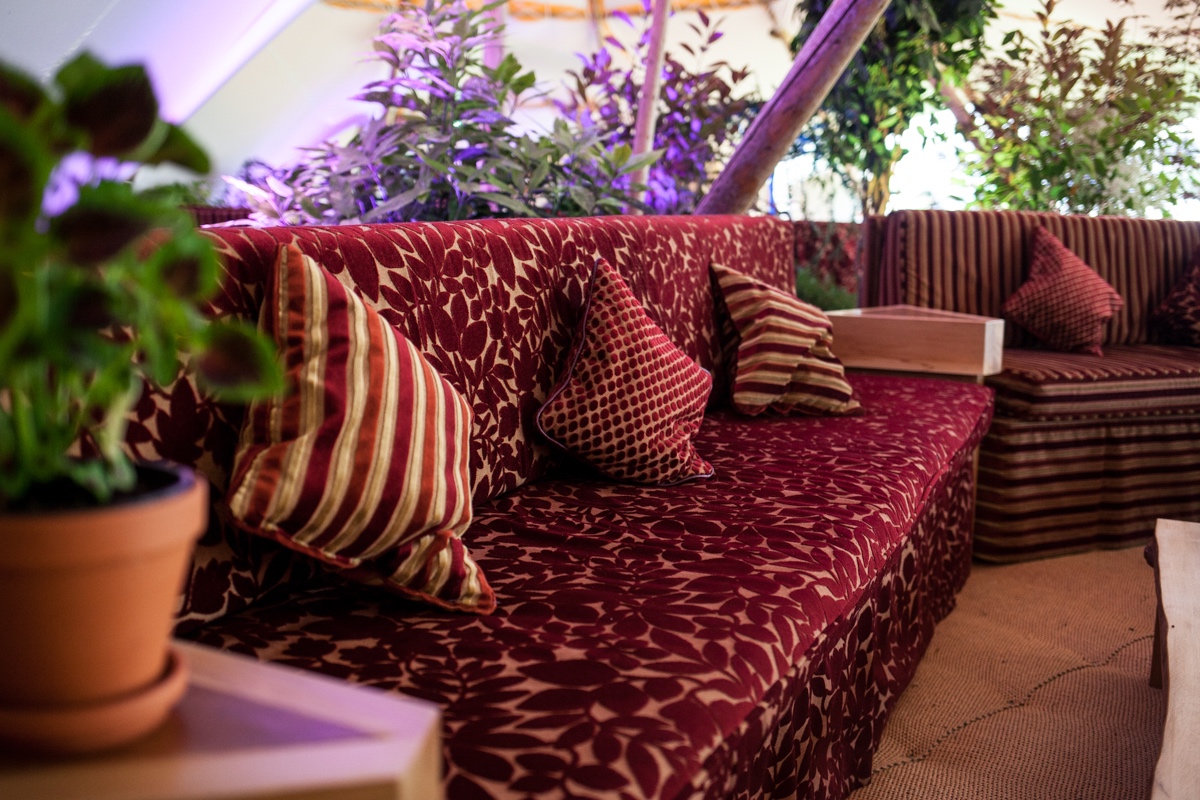 Wooden tables, banquettes and soft furnishings can be hired to furnish our beautiful giant tipi tents for your wedding, party or corporate event.