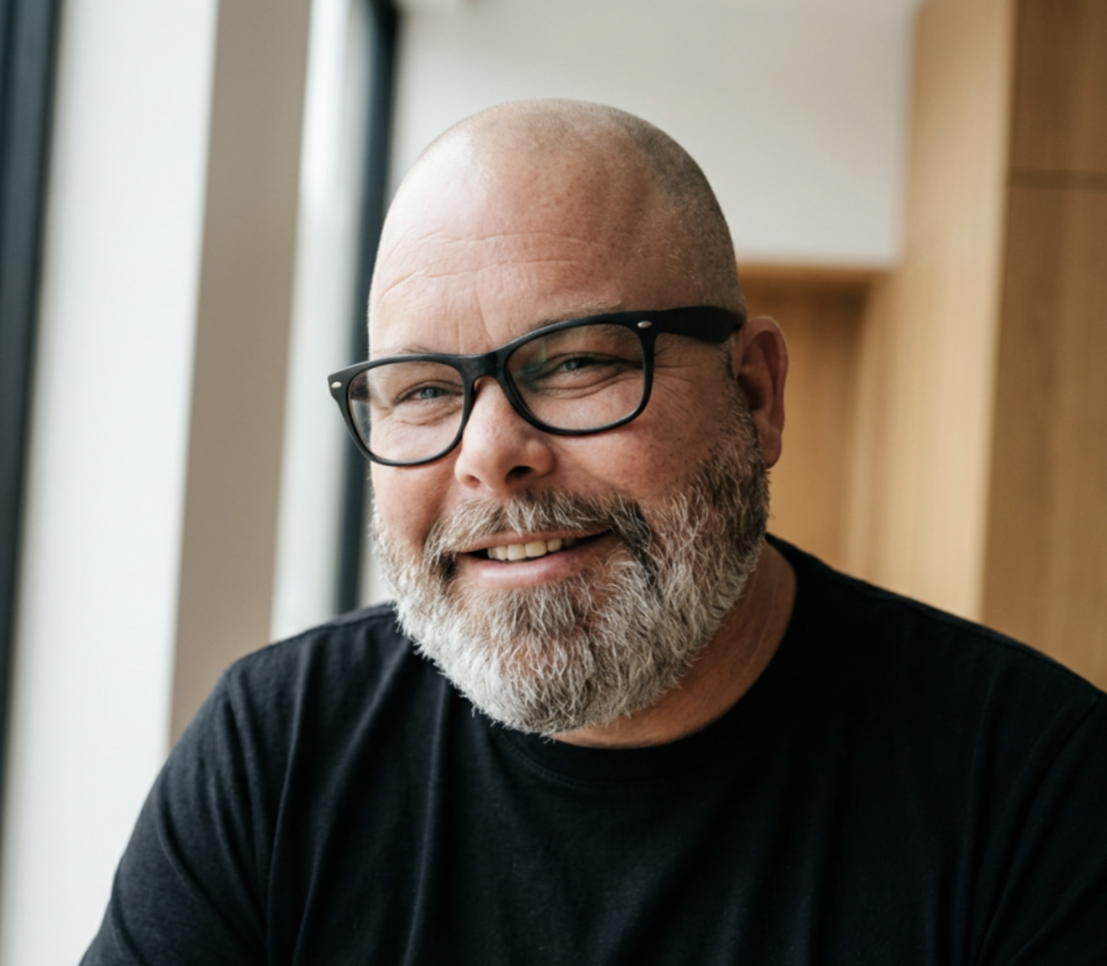 man with a beard wearing glasses