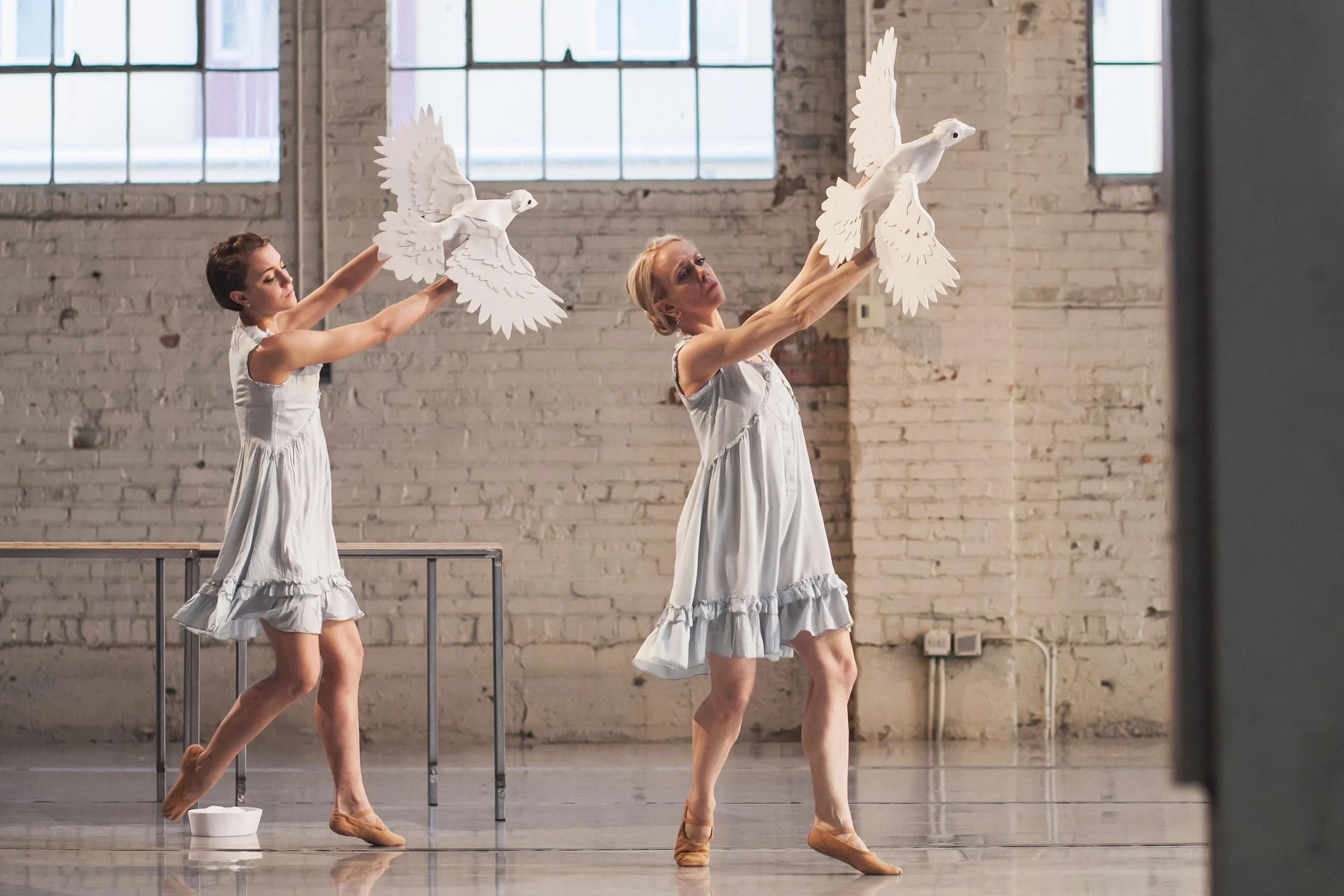 Wonderbound's Stephanie Moffett-Hugg and Sarah Tallman rehearsing Garrett Ammo's Aphrodite's Switchboard . Photo by Amanda Tipton. 2018
