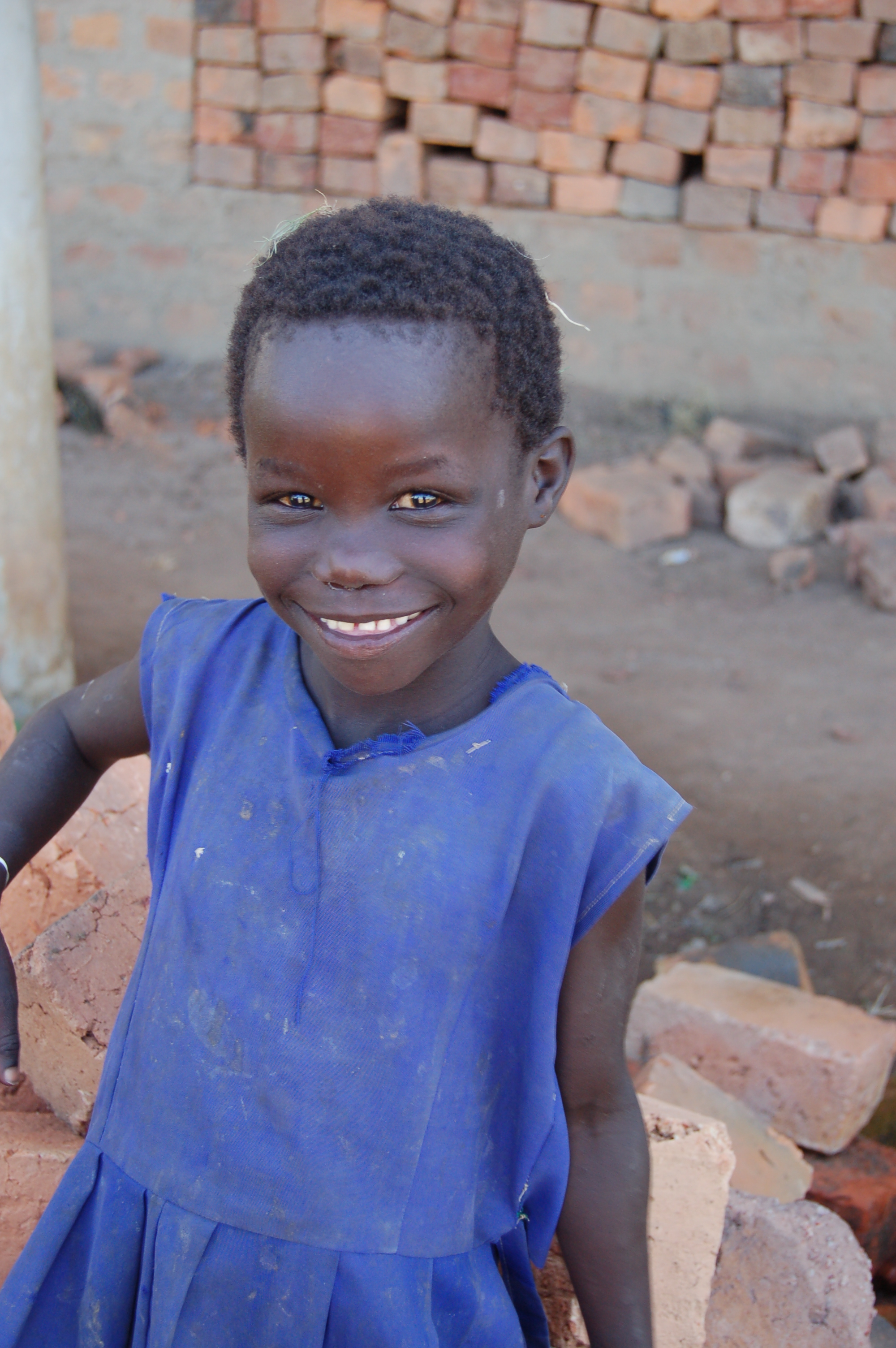 Young Girl in Blue - Bricks in the Background.jpg