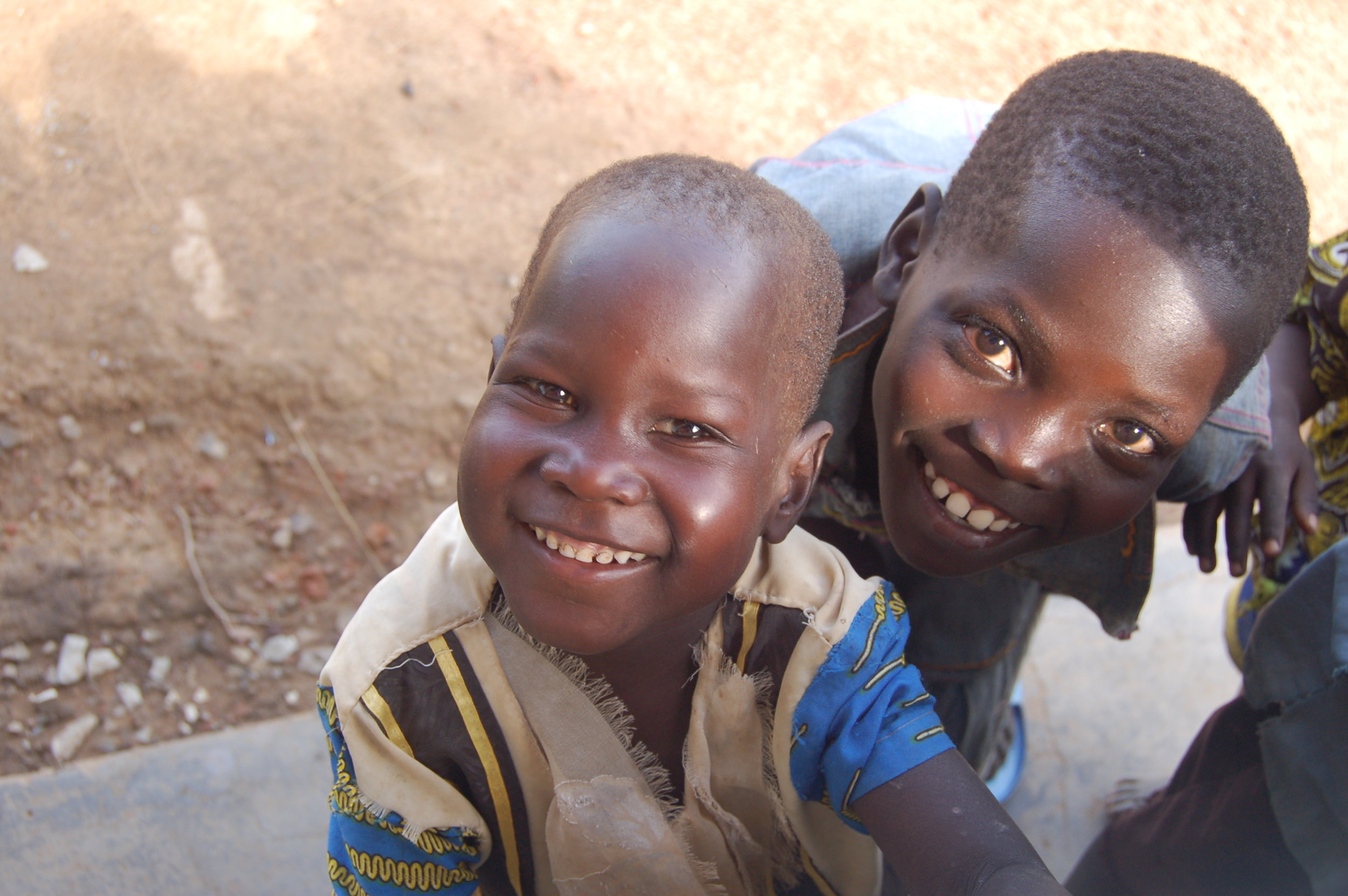 two children African shirt closeup.JPG