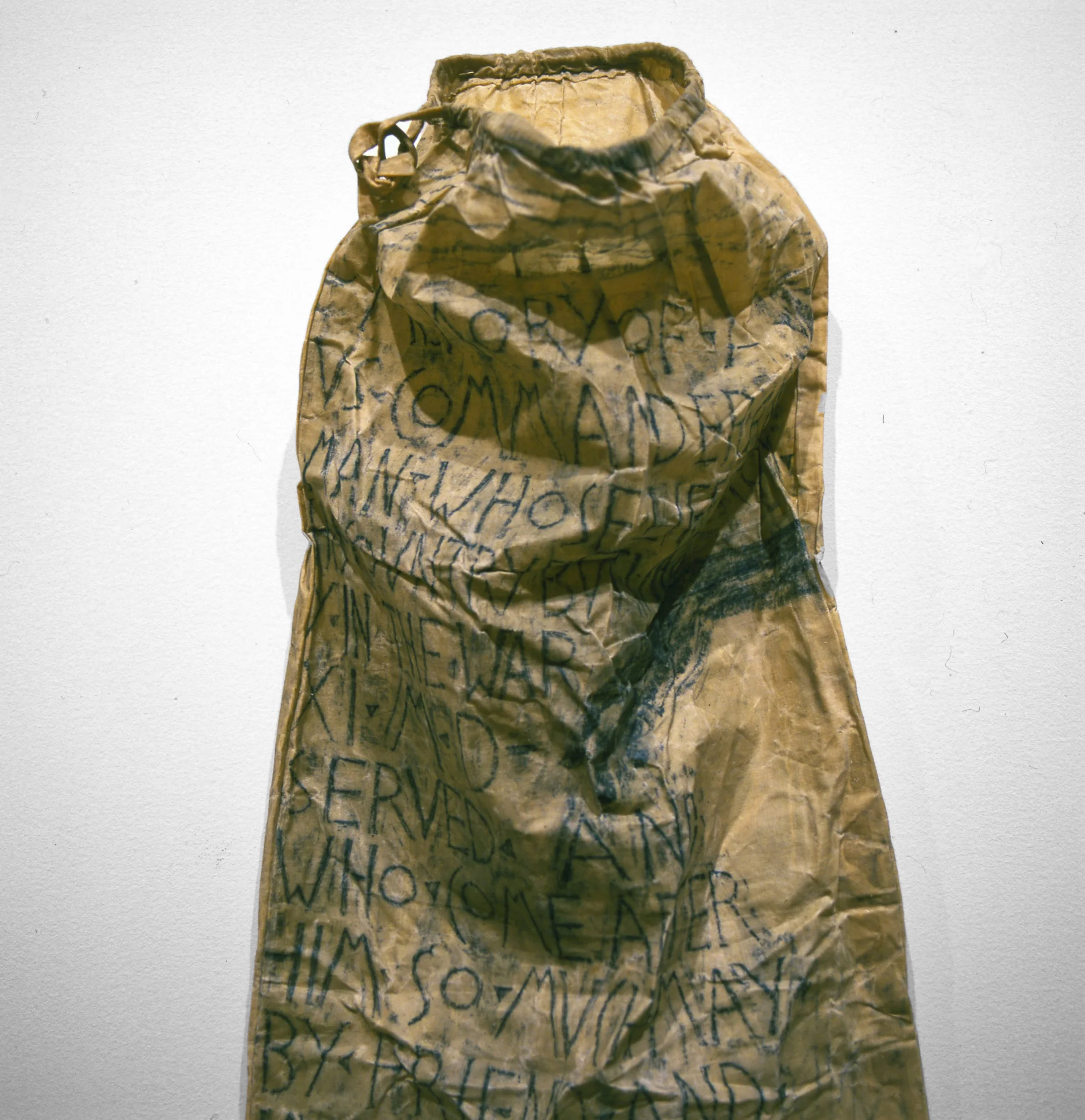 For this installation, the artist took rubbings onto muslin from structures—parks, buildings, sidewalks—on the sites of more than a dozen former burial grounds in Manhattan lost to development. The waxed muslin sacks refer to colonial-era cerecloth from which burial shrouds were made.