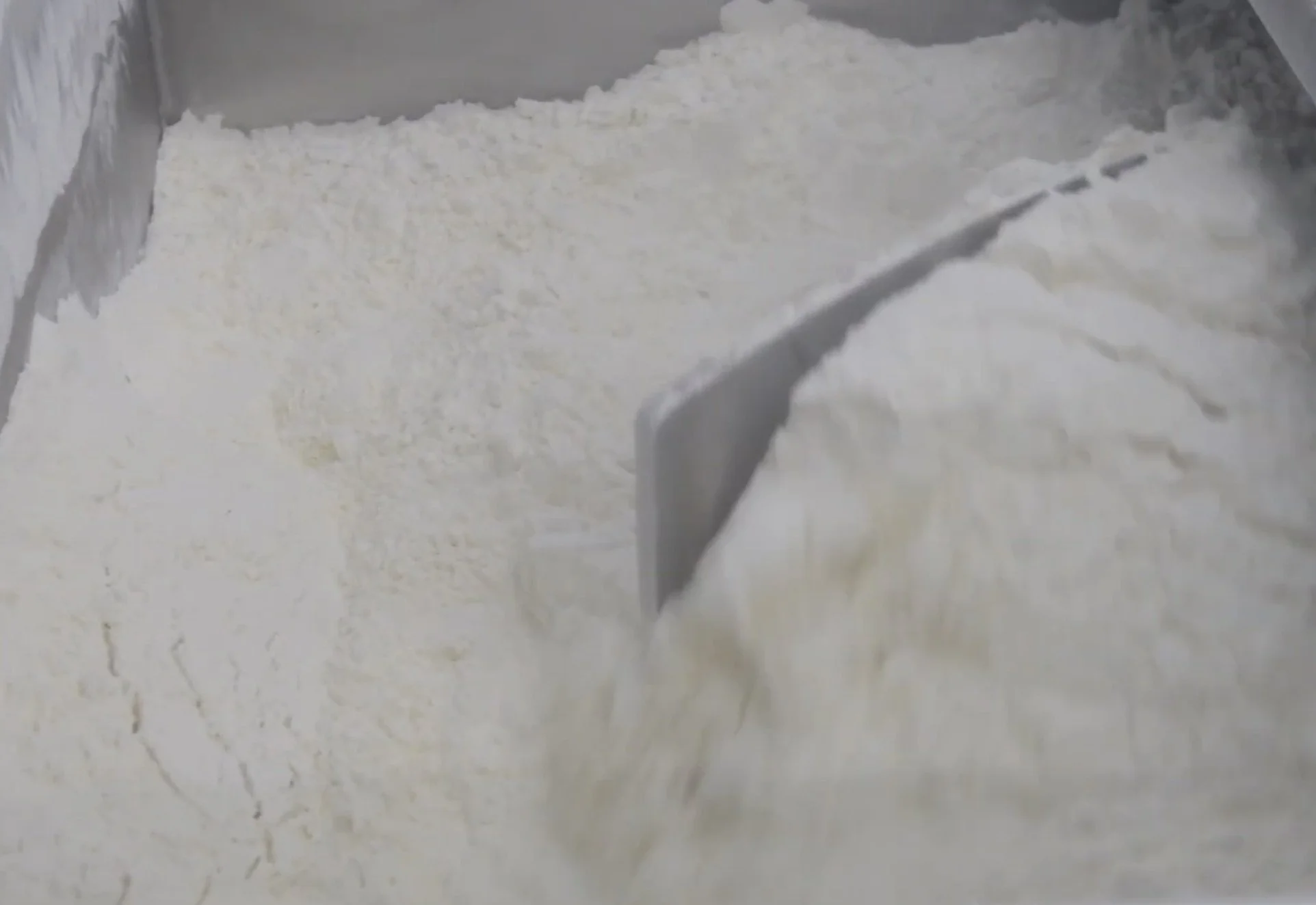 Powder being blended inside our Paddle Fluidizer Blender