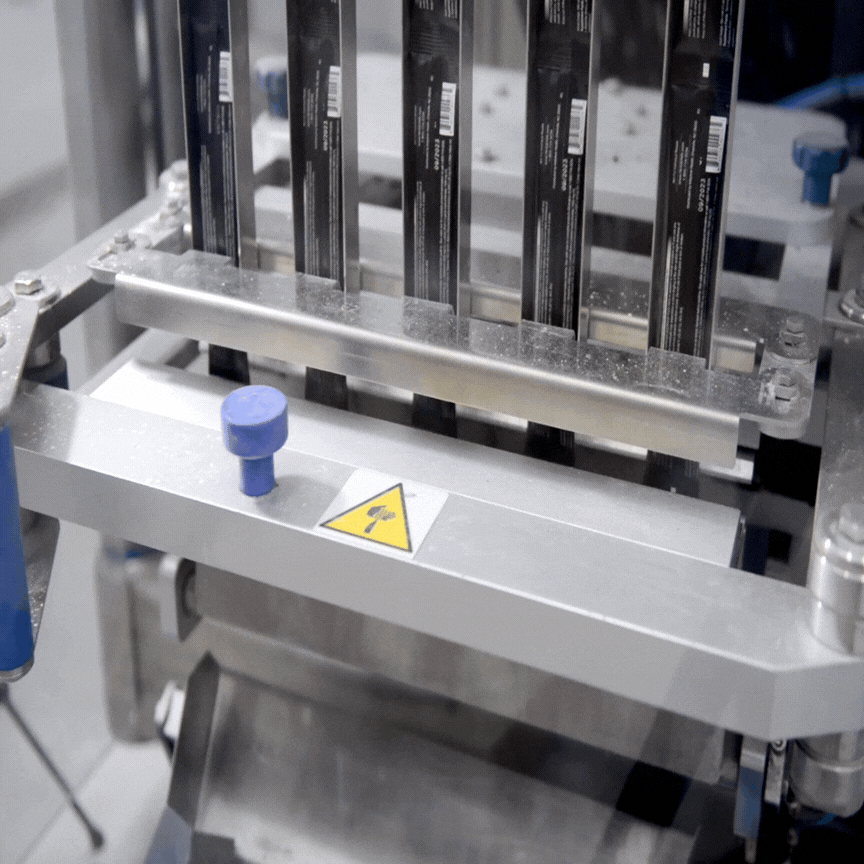 GIF of multiple lanes of stick packs being manufactured by Nutra Connection's VFFS machine in their Utah Manufacturing facility.