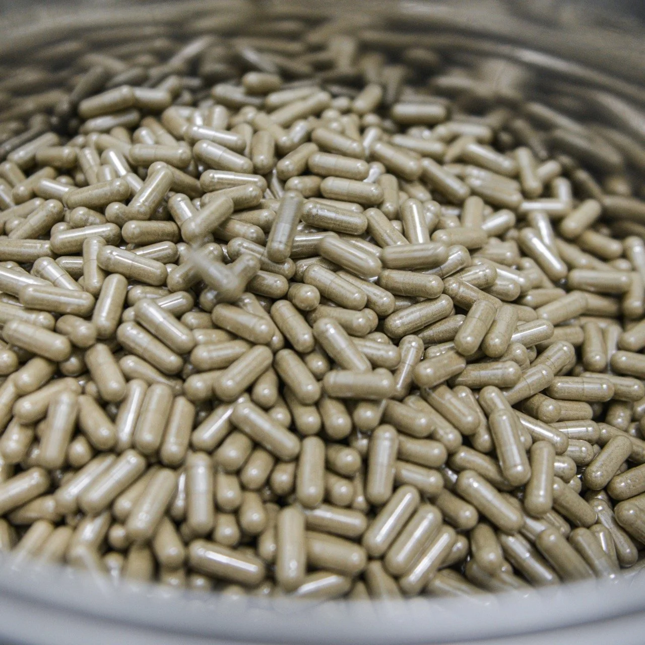 Image of completed capsules in Nutra Connection's encapsulation room.