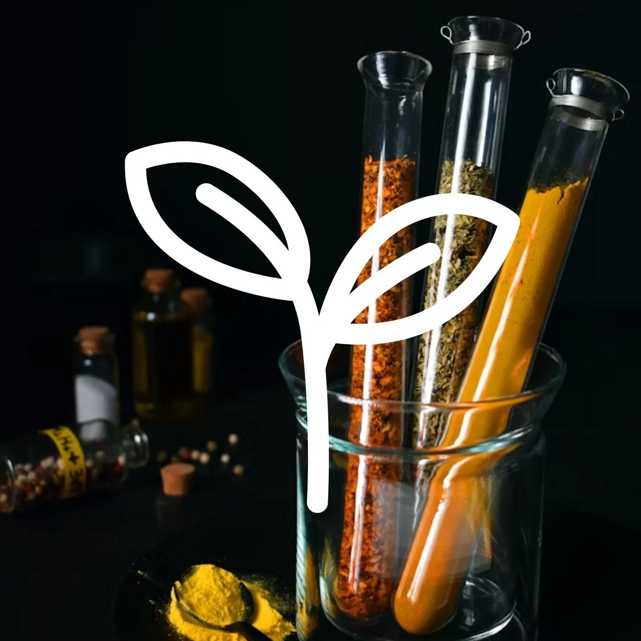 Plant/product development icon over an image of powders in scientific measuring tools.