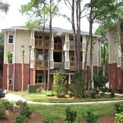 Ribbon Cutting for Sea Island Apartments Purchase