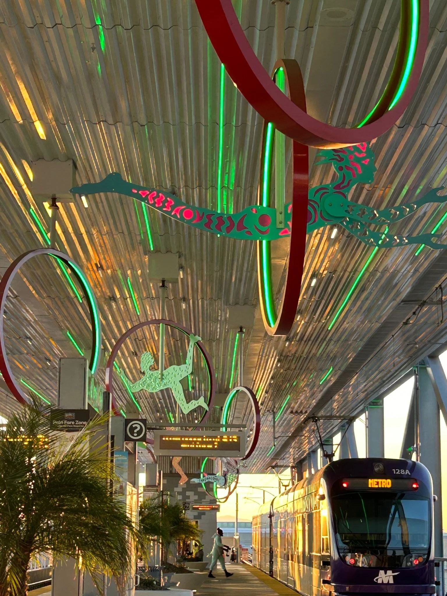 Valley Metro Muses: Seven acrobatic "MUSE" figures activate the overhead space of the Metro Center Light Rail Station.  This station provides public transit for CASTLES and COASTERS beloved valley, amusement park. 