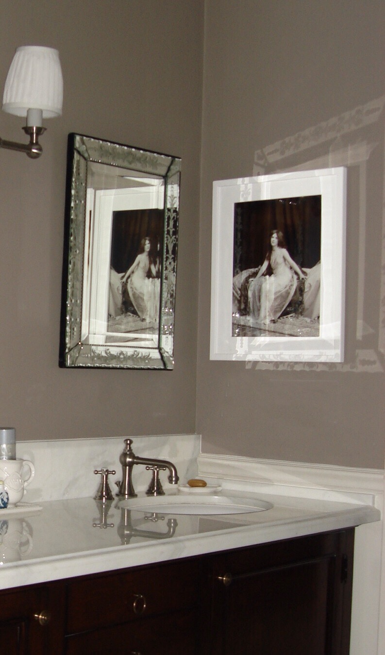  WESTWOOD RESIDENCE  Full bathroom remodel, custom walnut vanity, plaster wainscoting and hidden storage with a separate freestanding clawfoot tub to create character (not pictured). 