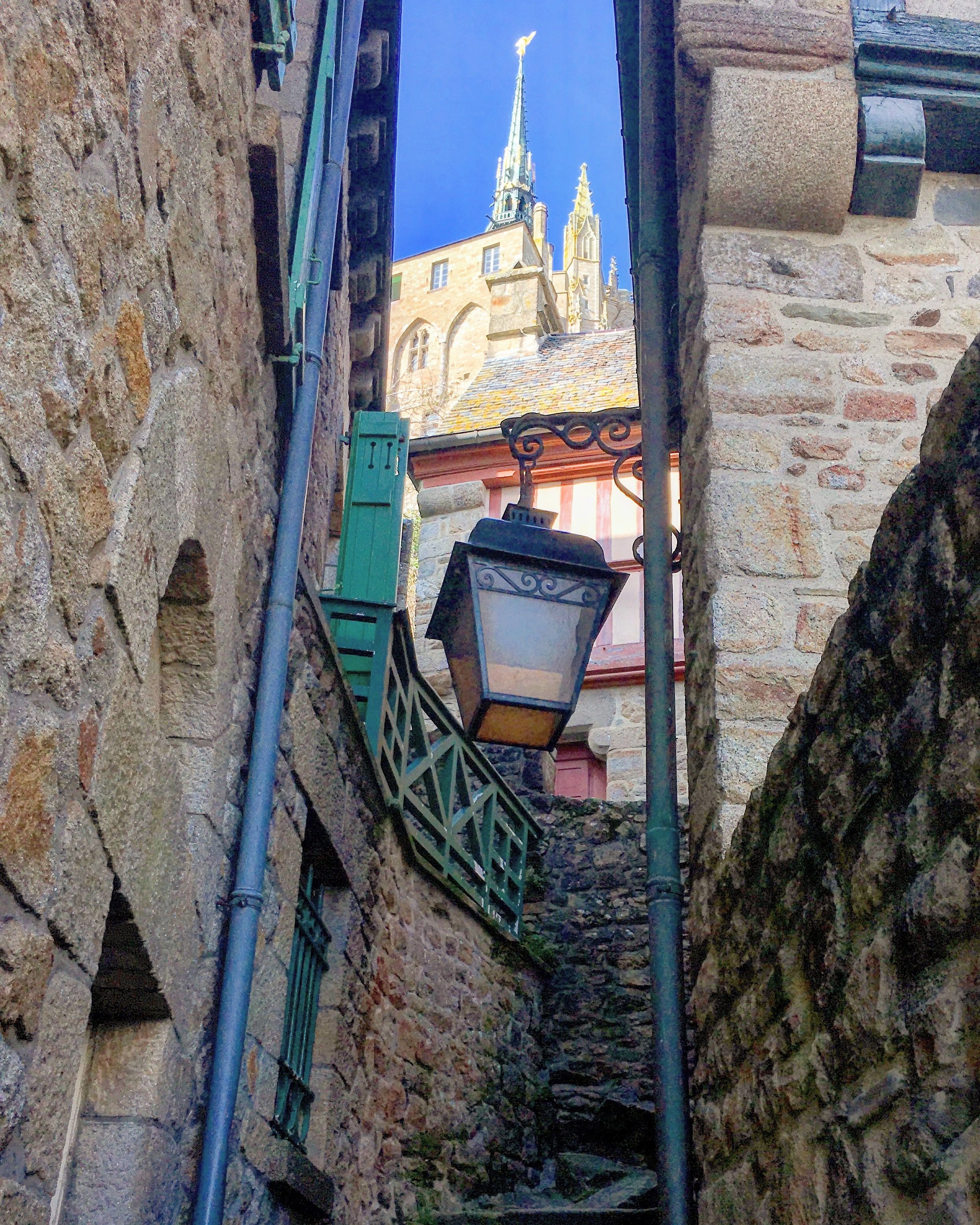 Coming back down the Mont - you can see the golden Saint Michael atop the spire.