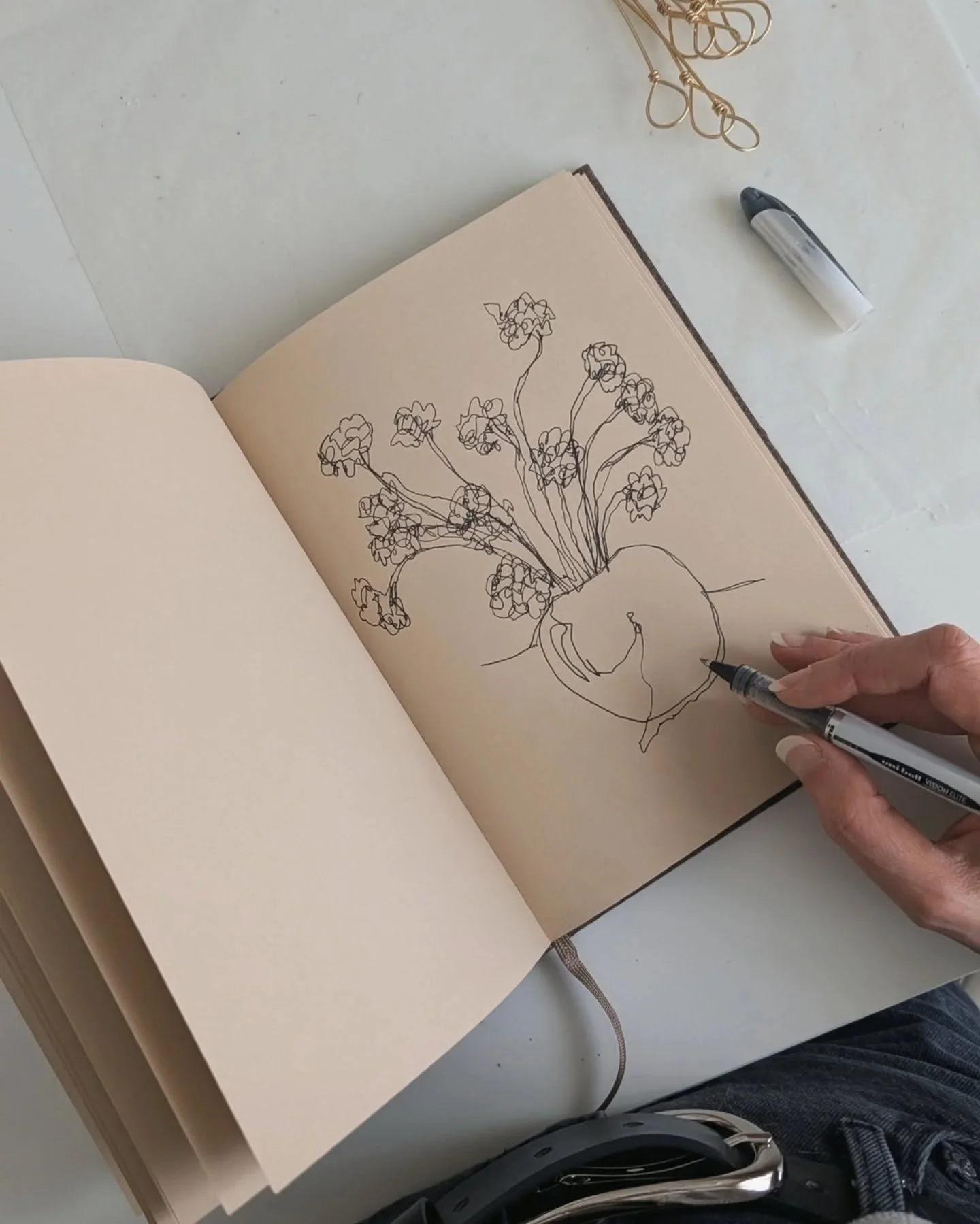 Florals, snakes, and dinner plates continue as the new collection of paintings and drawings takes form