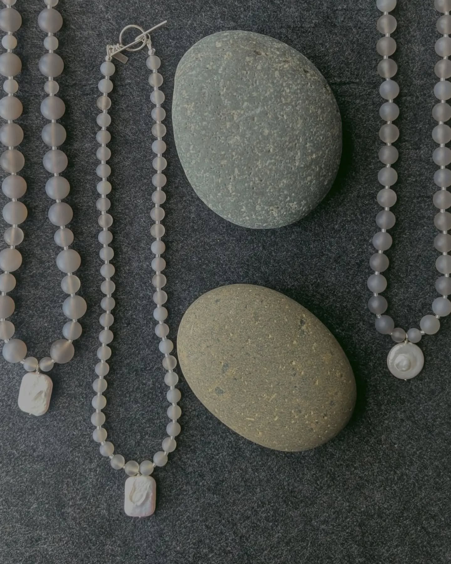 Variations on a theme, each one-of-a-kind.
Matte frosted grey chalcedony with freshwater pearls and a hand-formed toggle clasp ~ Available at karibreitigam.com