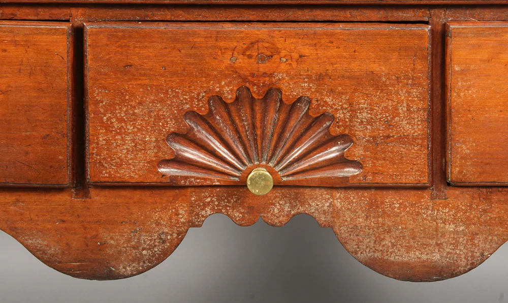 Detail of a Queen Ann highboy, as seen before conservation