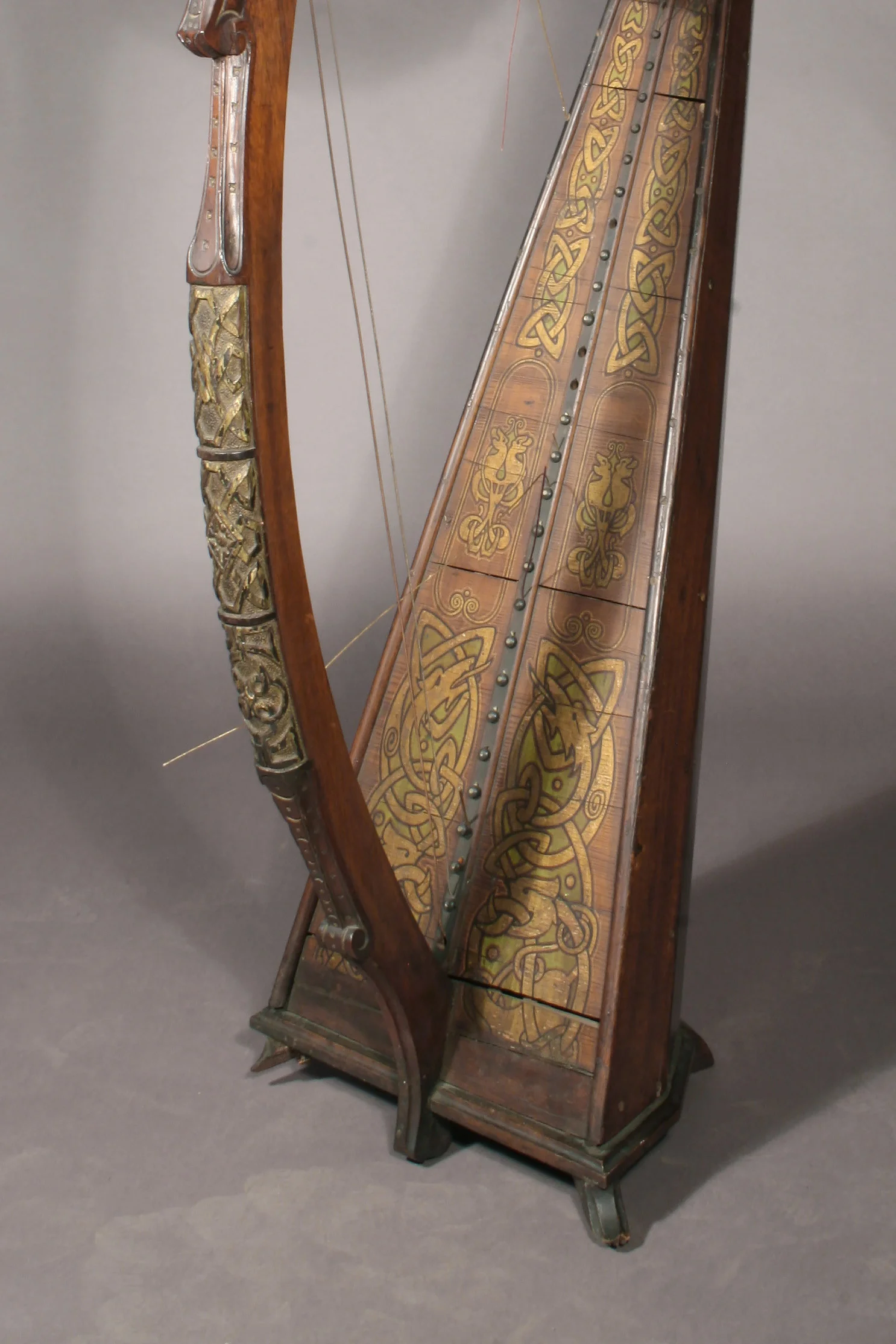 Before treatment: Detail of an Irish-inspired polychrome historic harp from the studio of American harp maker Melville Clark