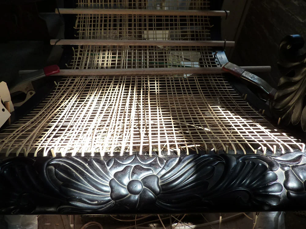 Hand caning in action