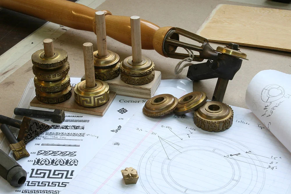 In preparation for leather application and tooling, the client was presented with possible patterns and design solutions.