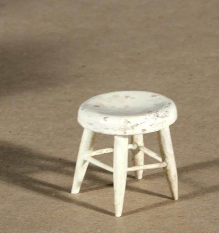 Photo: Historic dollhouse miniature stool after repair