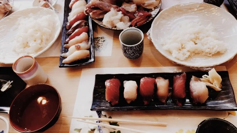 At a cooking class we learned the art of making nigiri sushi- raw fish placed on top of sticky white rice.