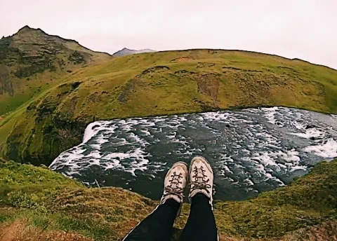 Taking in the view after hiking to the top of the Skogafoss waterfall.
