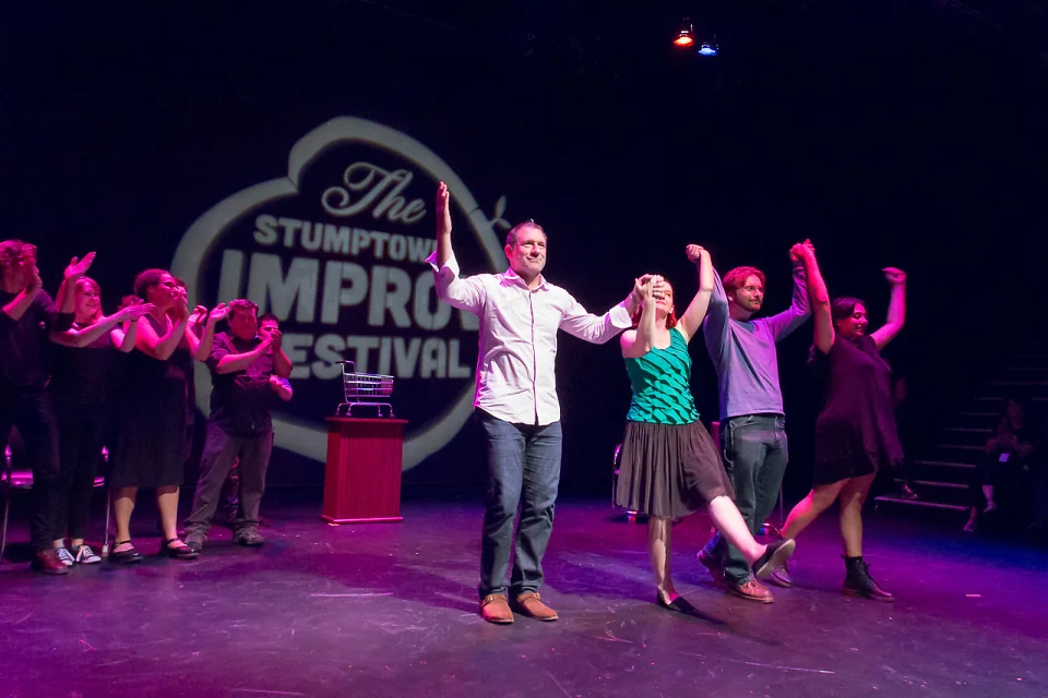 David (in front at left), taking a bow with other members of The Brody Theater during the 2016 Stumptown Improv Festival