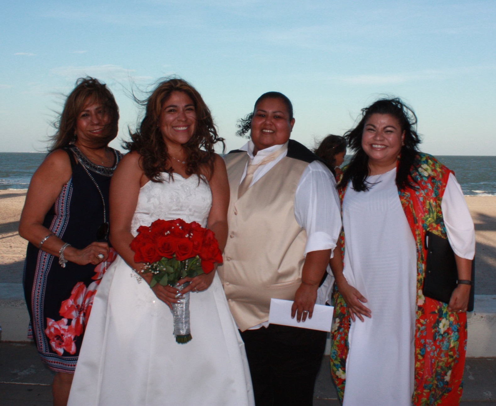 LGBTQIA+ wedding by the sea performed by The Love Officiant Renee Reyes