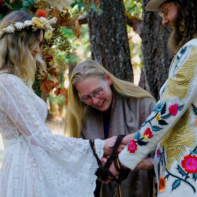 Celebrant conducting a handfasting ceremony