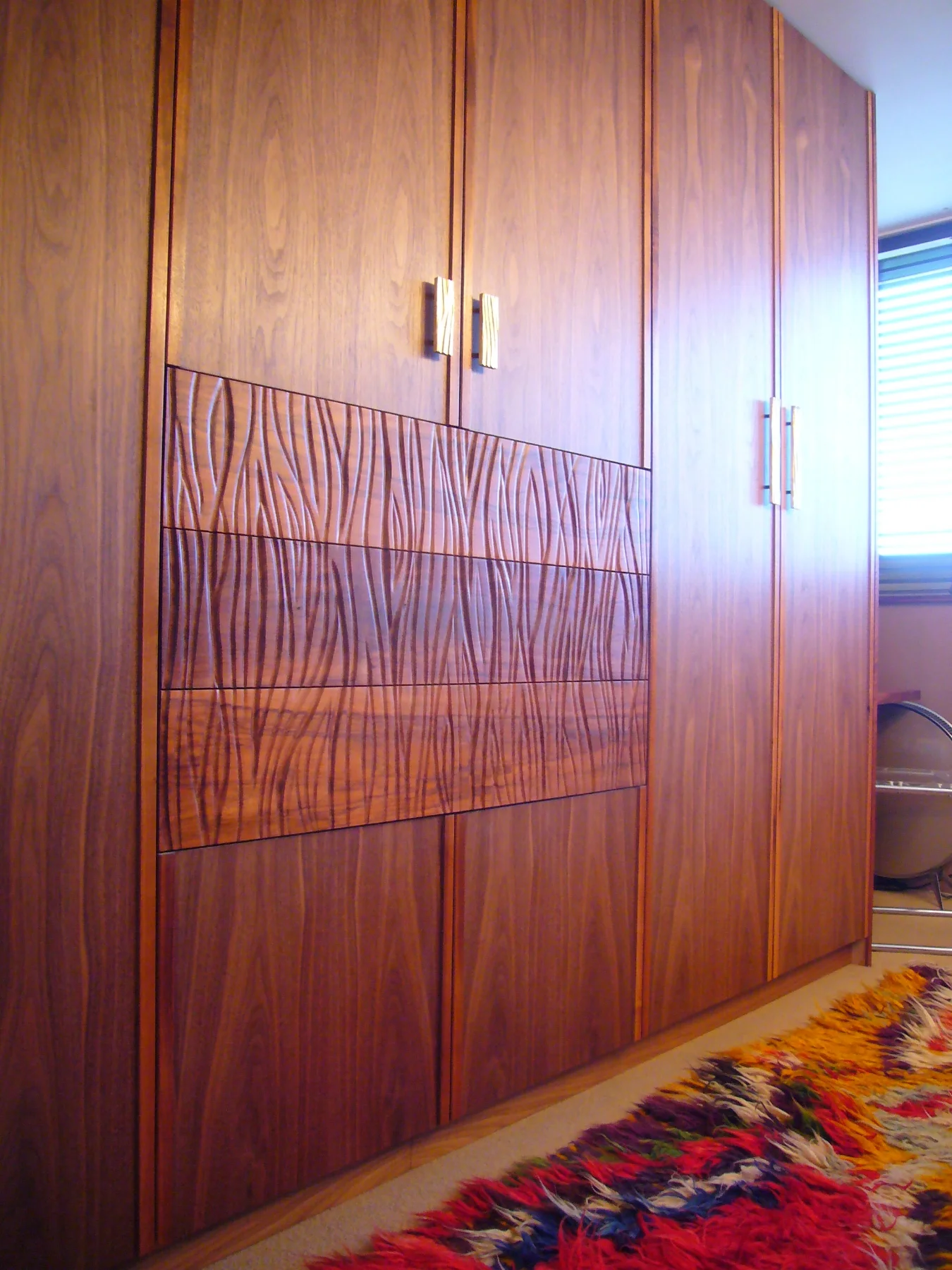 Hand carved walnut drawer fronts