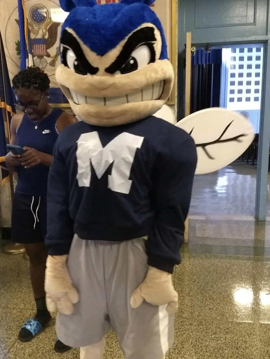 Howie, the new mascot, greets students. Photo Credit: Tanisa Rahman