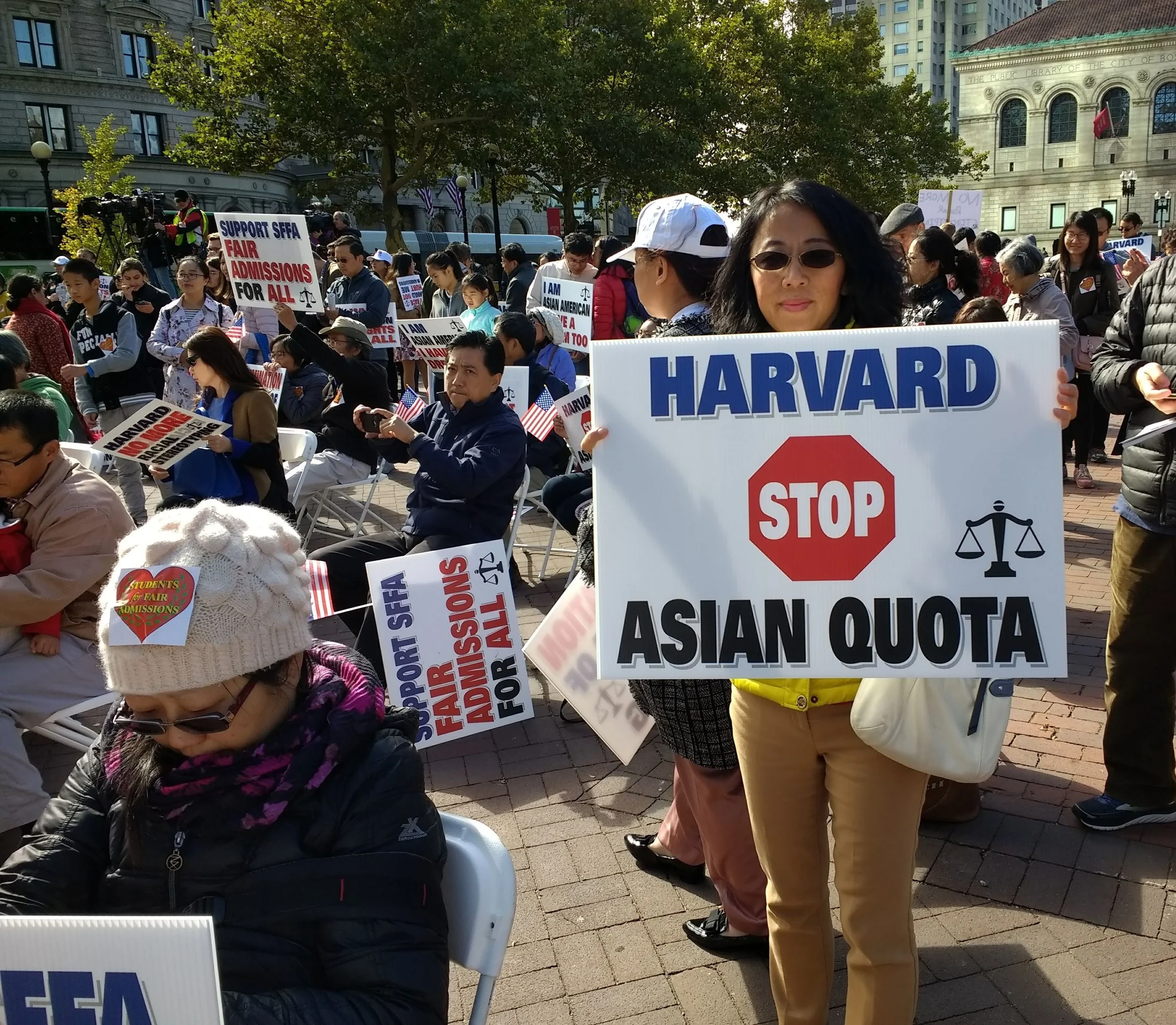 Asian Americans crowd Howard Square in attempts to promote fair admission into Harvard University. Photo Credit: Wikimedia Commons