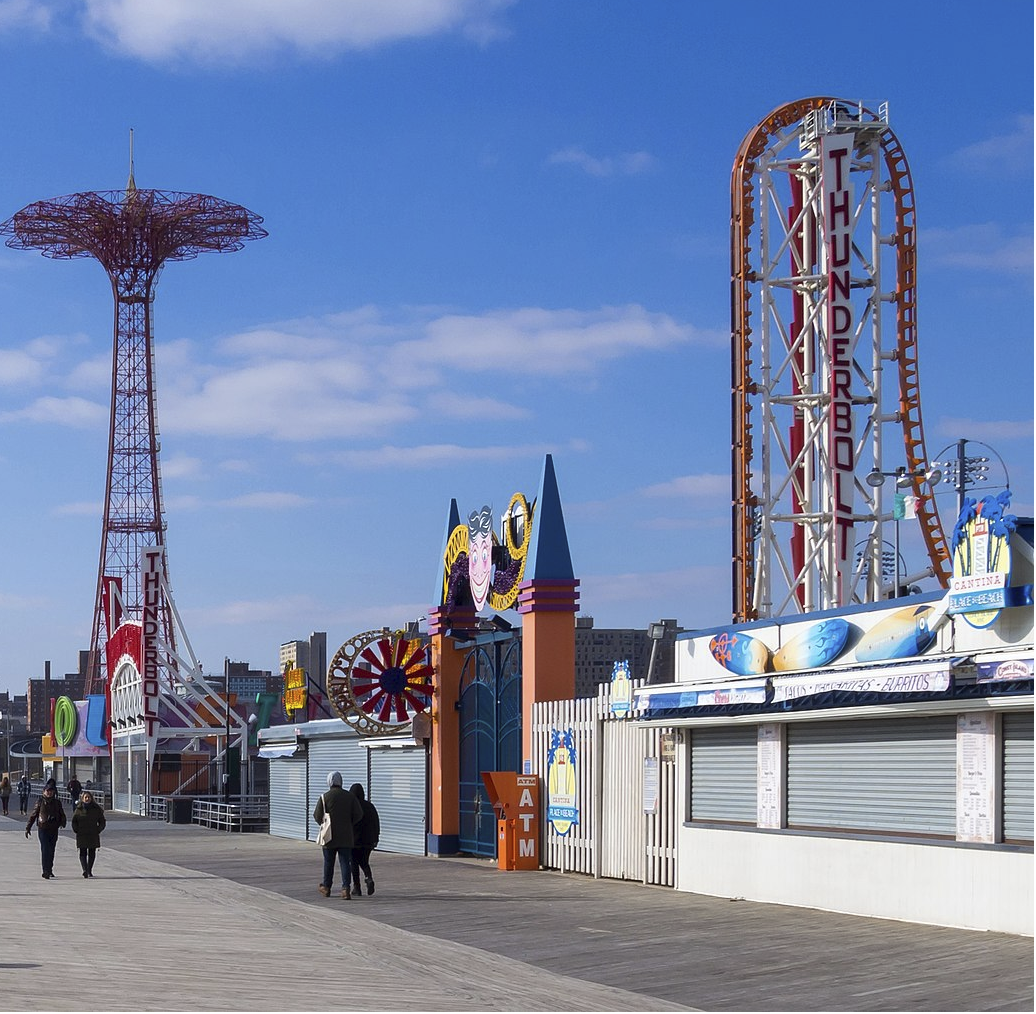 Coney Island’s ocean view, hot dogs, and deserted theme park rides offer a unique atmosphere in winter. Photo Credit: Wikimedia Commons