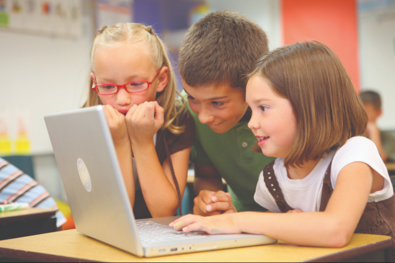 Technology can isolate kids indoors, but it can also provide social opportunities. Photo Credit: Wikimedia Commons