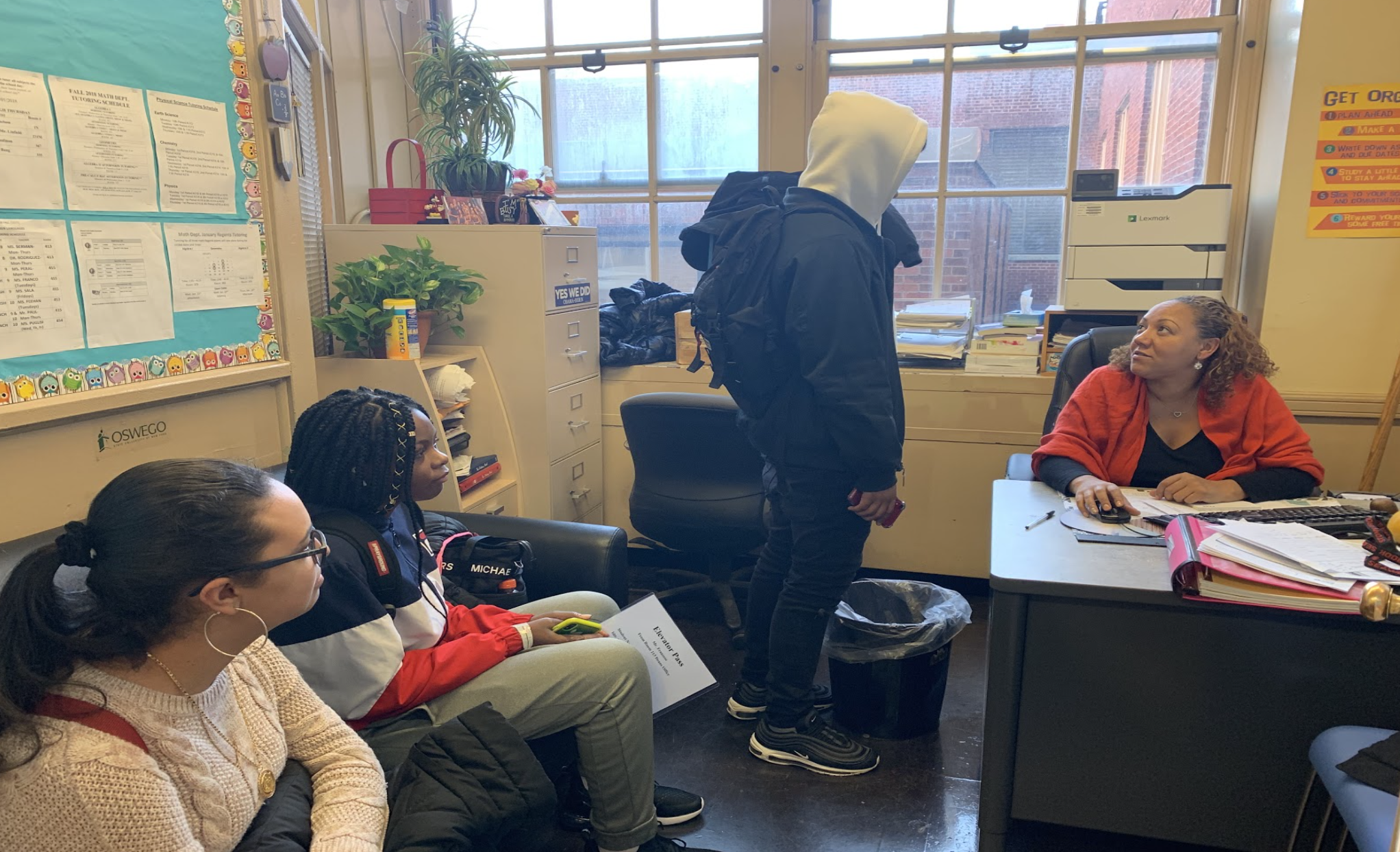 Guidance counselor Ms. Sakaina Simon meets with students. Photo Credit: Nia Dove