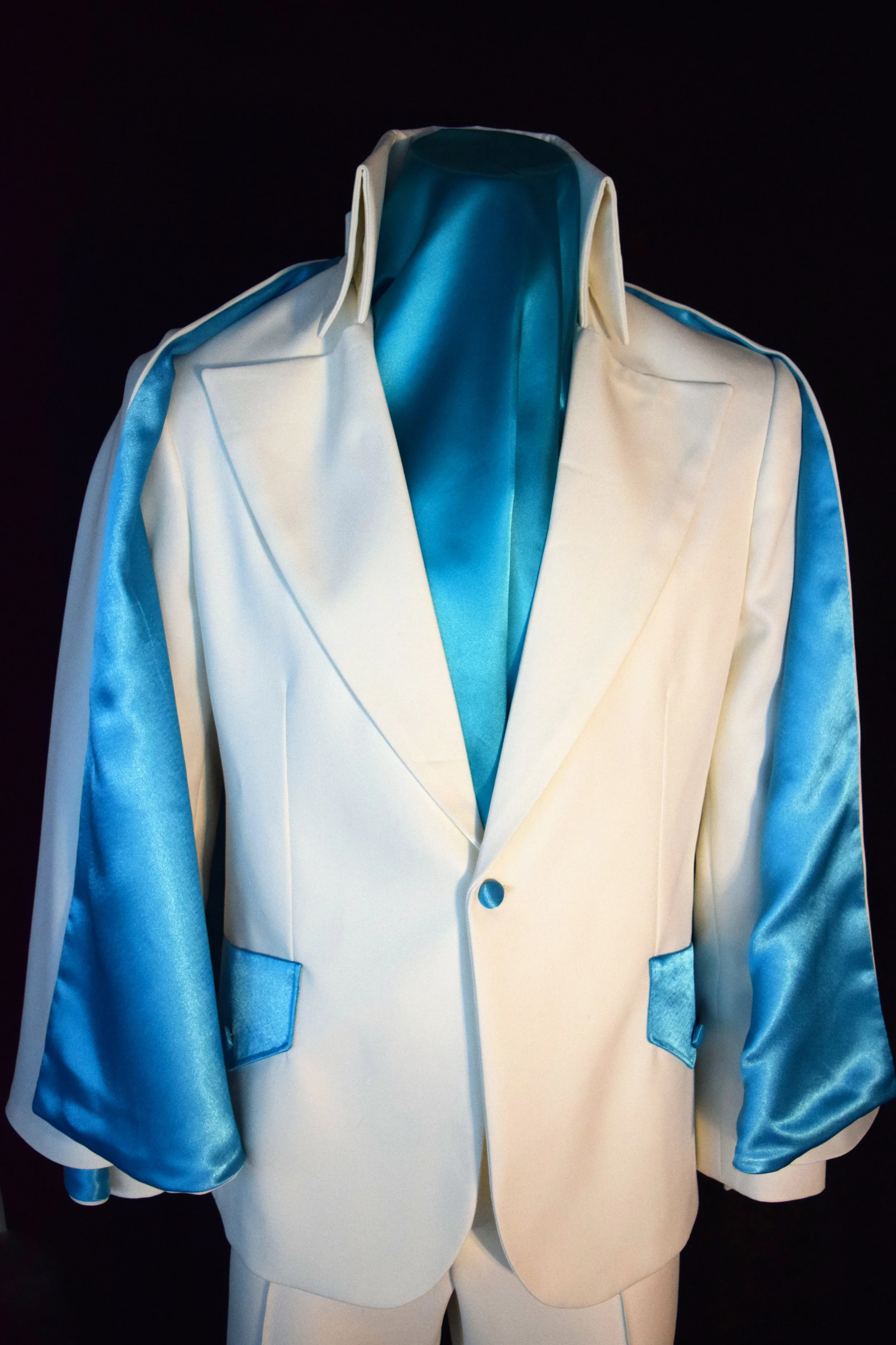 Vented Jacket White with Turquoise Front with cape.jpg
