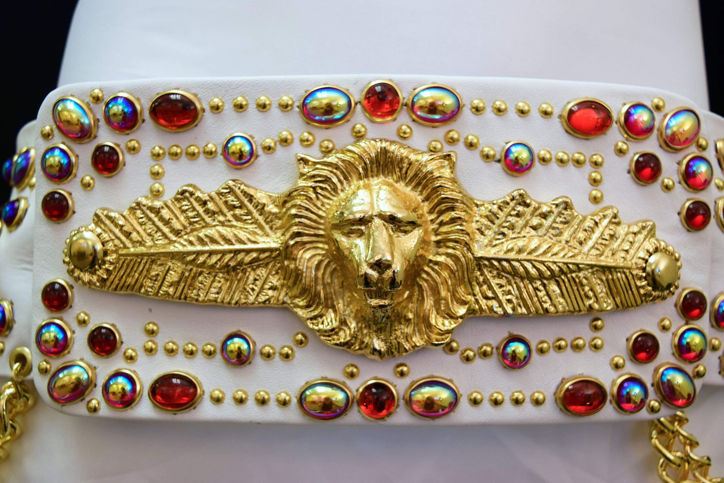 Lion and Feather Belt Red Buckle.jpg