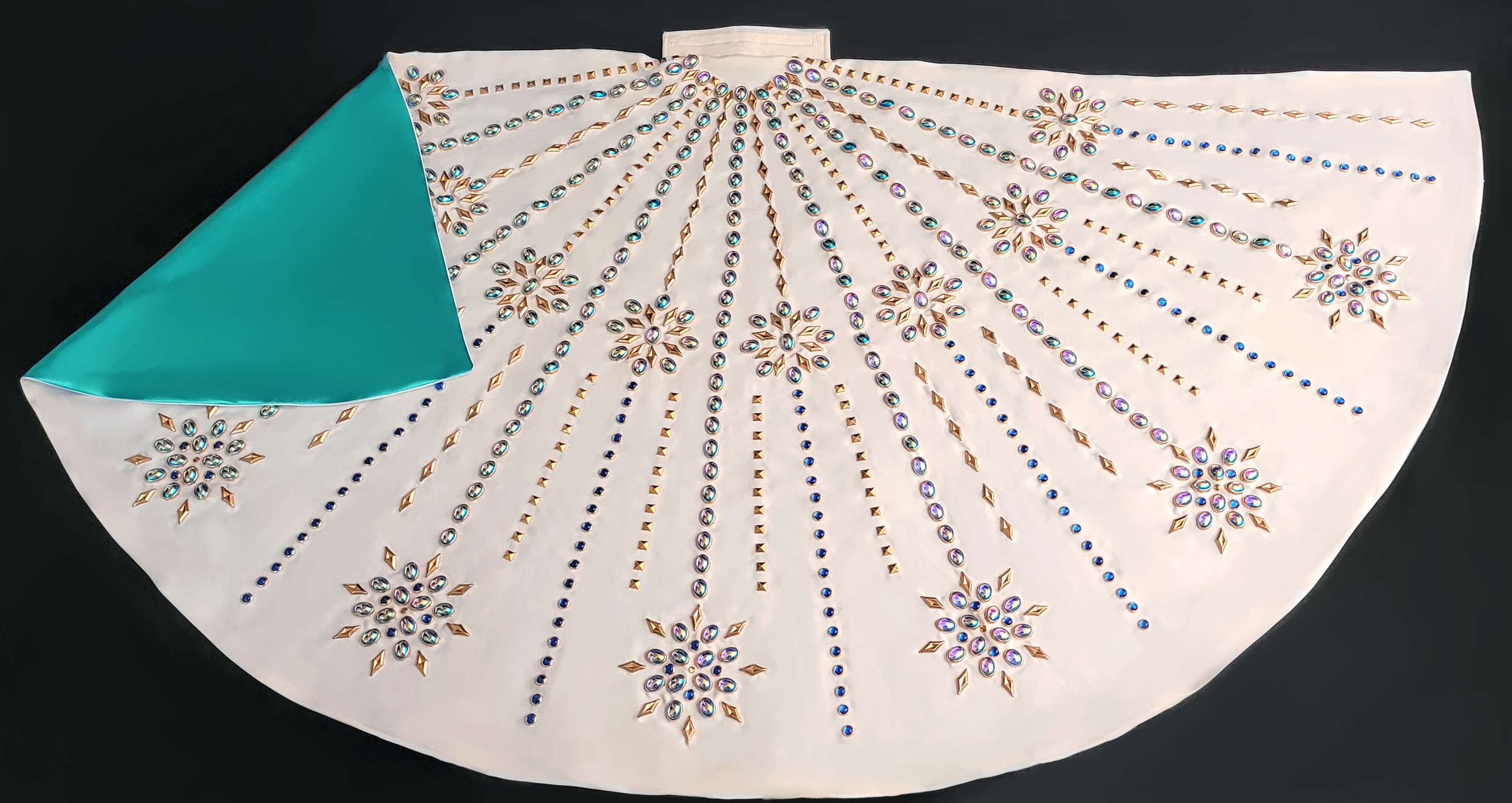 Snowflake Turquoise Cape 2023.png