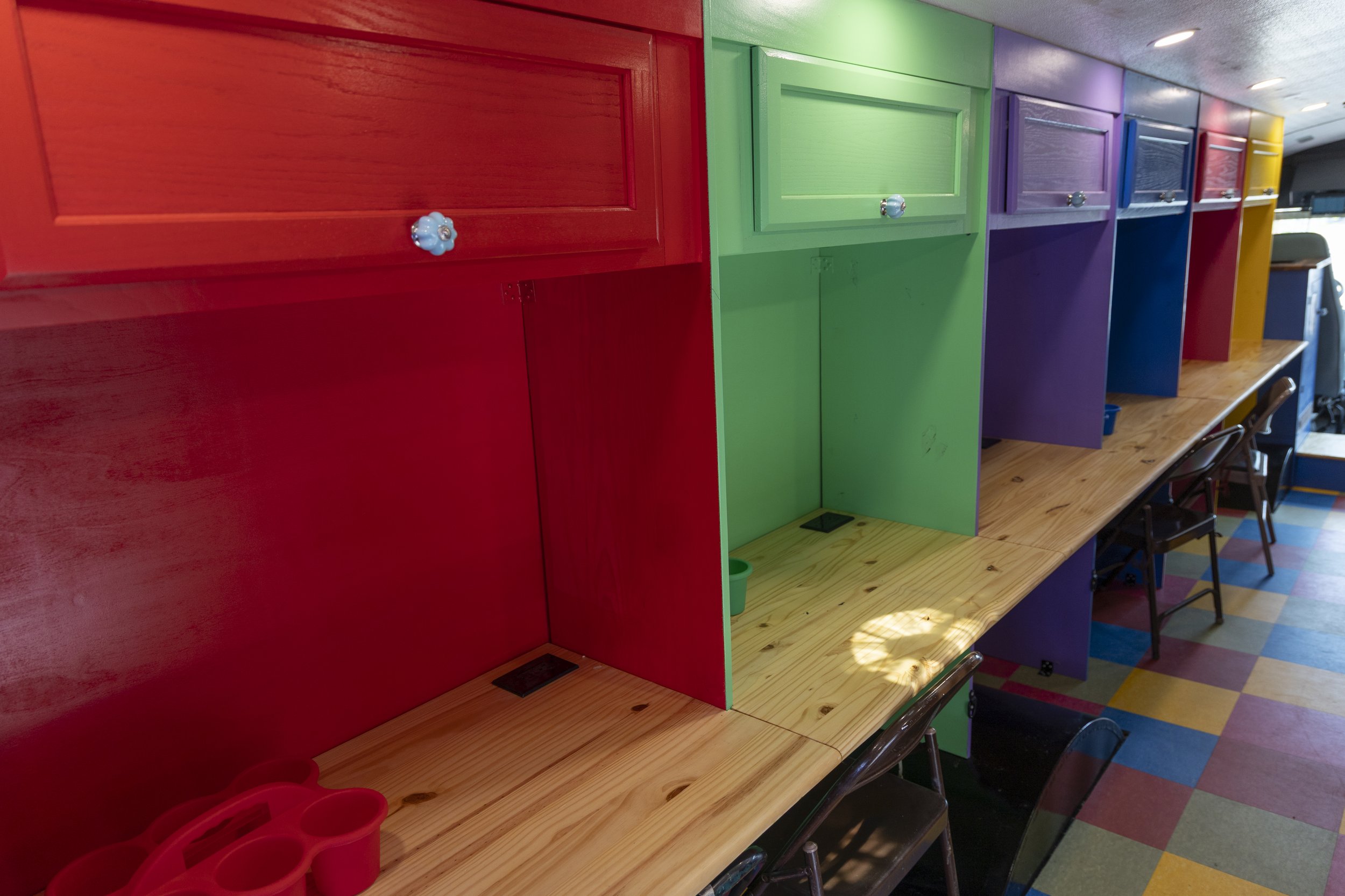 A View of the Art Cart's Colorful Artist Workspaces