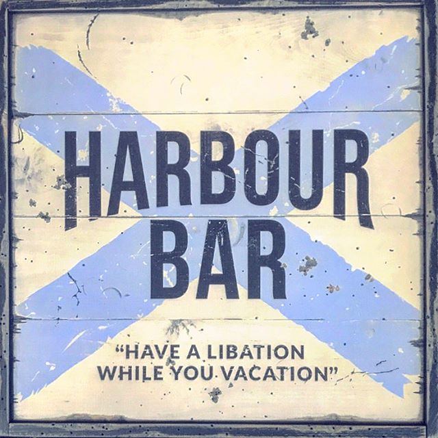 street sign. &lsquo;have a libation while you vacation&rsquo;. will they be the strongest, most delicious rum drinks on the island...? you&rsquo;ll have to come find out! #rum #bahamas #harbourisland @islandcompany