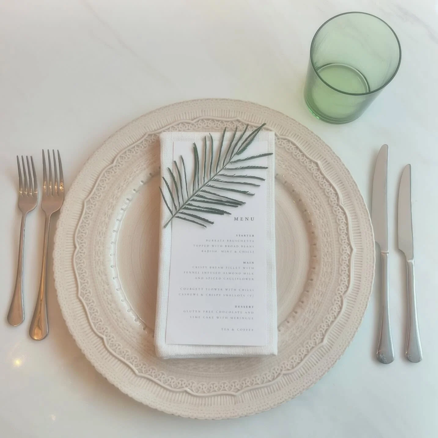 Transforming tables into captivating works of art is one of the best parts of styling sessions! Today, I&rsquo;m thrilled to share a fresh, earthy look featuring our stunning latte stone charger plates, complemented by lush green glassware and fresh 