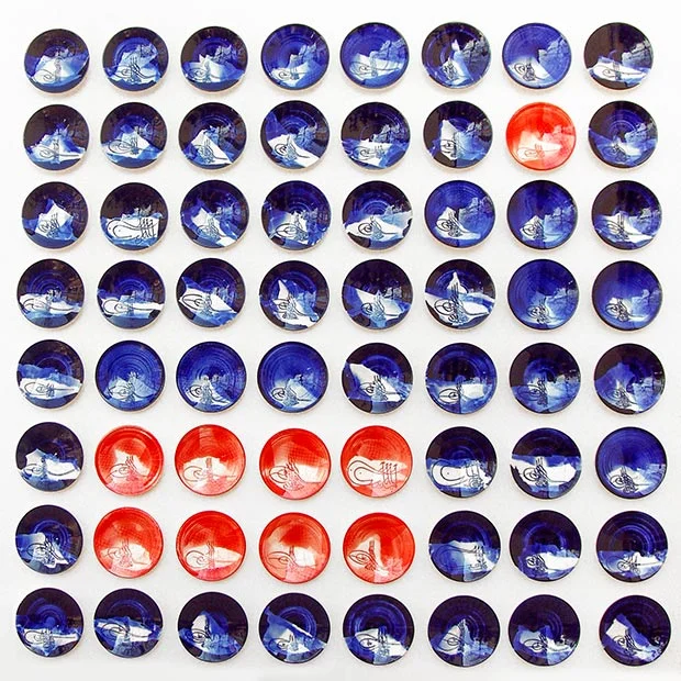 'Mystery of Blue: Tugras' installation, earthenware, underglaze blue slip and underglaze pigment, cobalt oxide,175x175 cm, 2005 / Courtesy of the artist
