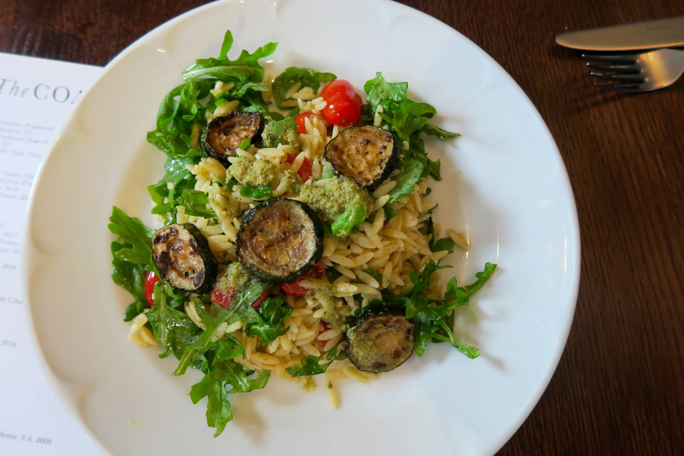 Orzo, courgettes, tomato, wild rocket and hazelnut pesto