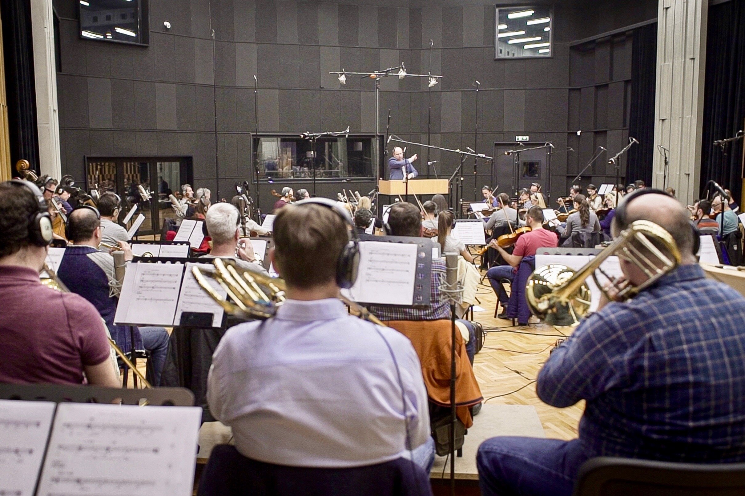 The score was performed by 70-piece strong FAME’S Macedonian Symphonic Orchestra and later mixed by Casey Stone .