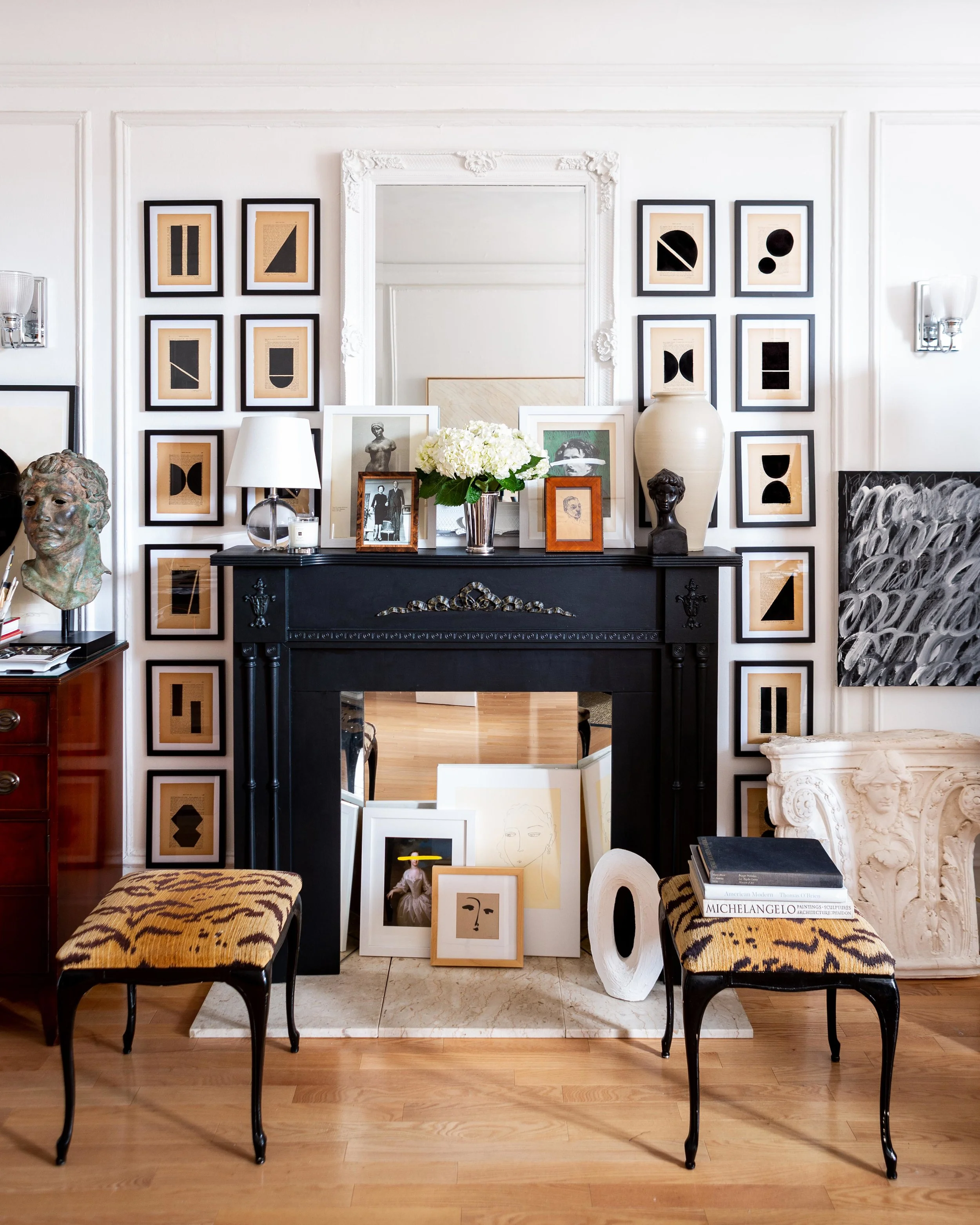 In all corners of the studio, Young’s artwork, such as this full suite of his Géométrique Collection, is juxtaposed with antiques-store treasures and his most beloved art books. “My work is just as much about the things I love as it is about me,” he says.