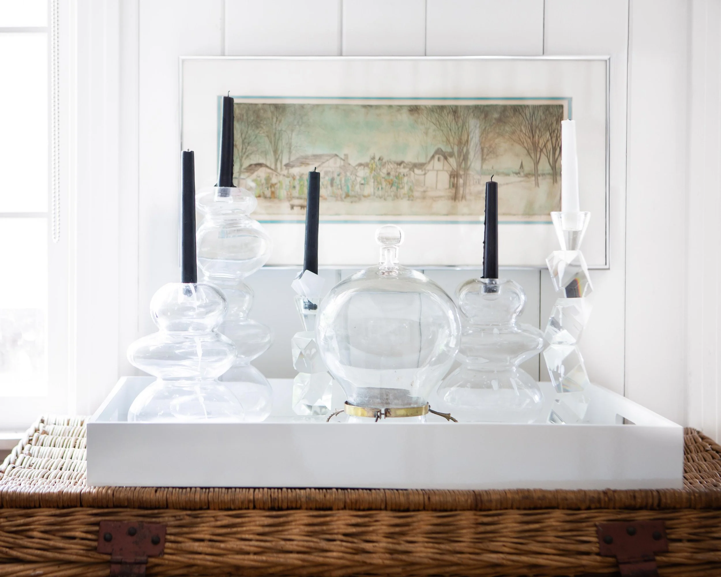 Throughout the Lockes’ lake house, there are little displays of like objects. “I’m definitely not a hoarder; I am ruthless when it comes to purging and getting rid of things,” Colleen laughs. “But I hang on to the knickknacks and things that I love, and it’s fun to throw them together into a tiny exhibit of sorts.”