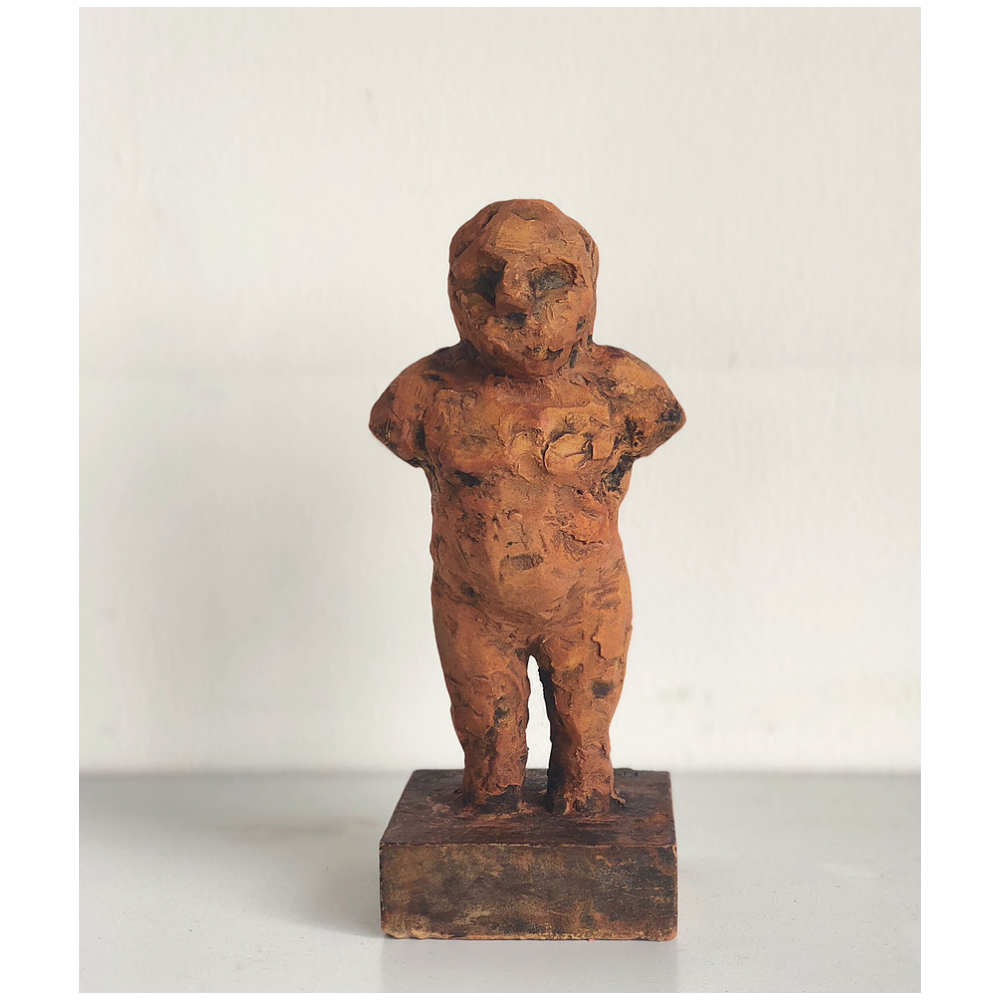 8" plaster figure with rust patina $750