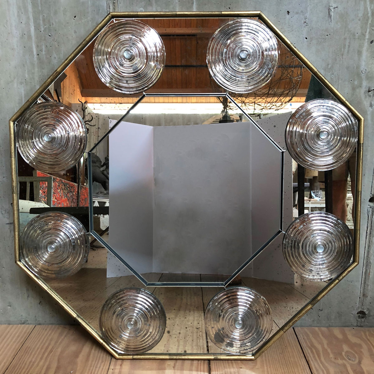 30″ Octagonal Bullseye Mirror, $3,575, RT Facts