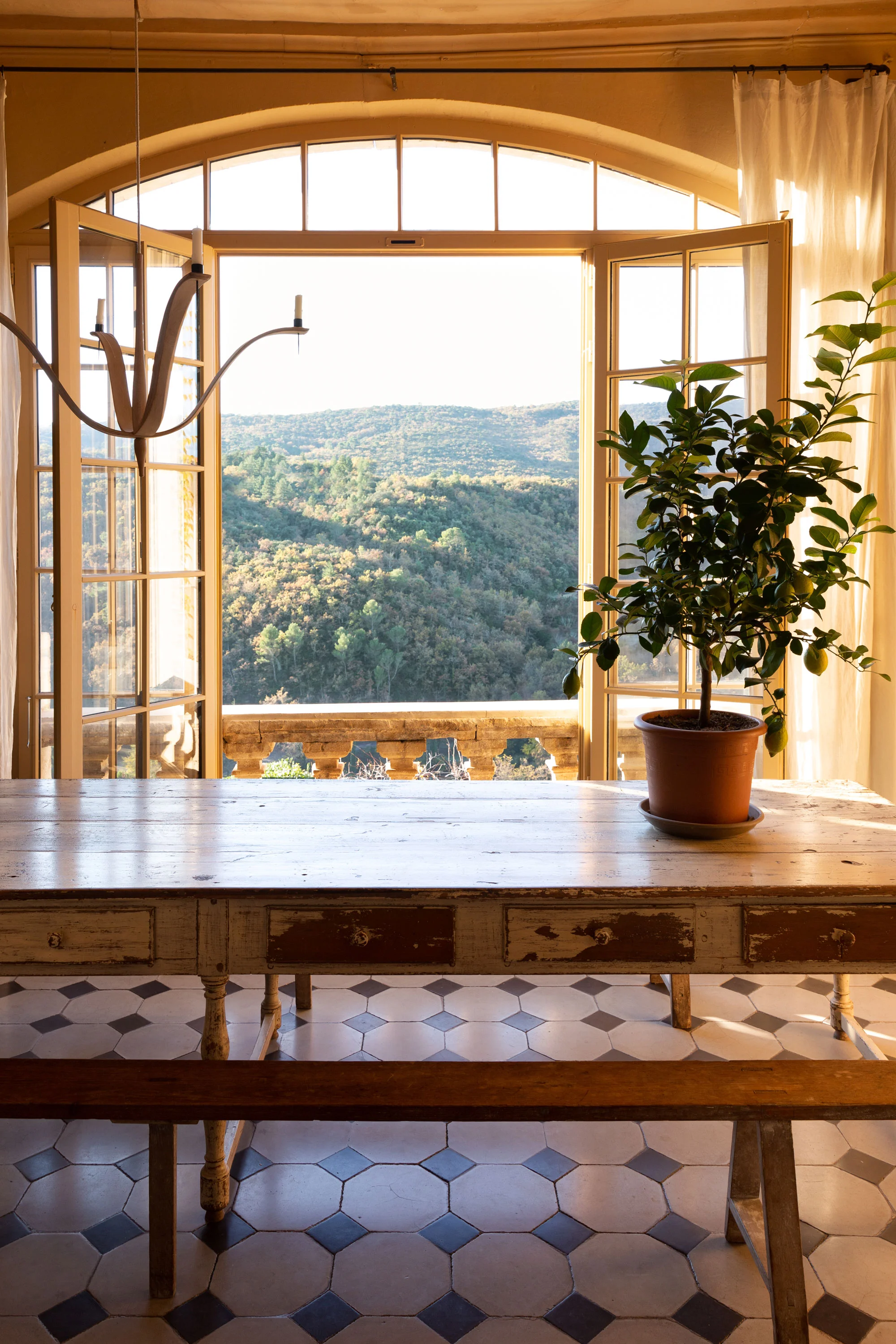 Looking out on the forests of the Luberon, Sharon and Paul’s Bonnieux apartment is one of several created centuries ago by splitting up a regal country home. Many were constructed during the 14th century, when Pope Clement V, a Frenchman, moved the Catholic Church’s headquarters from Rome to Avignon for 67 years.
